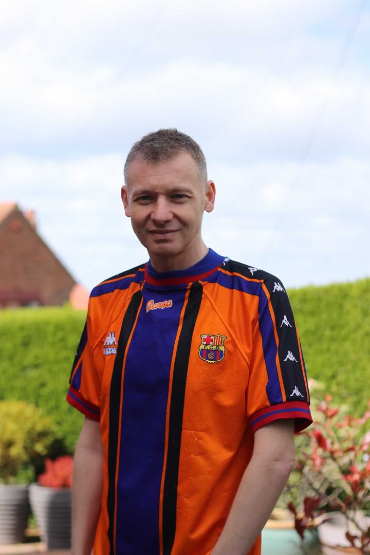 Michael 84 wearing Barcelona away shirt from 1997-98