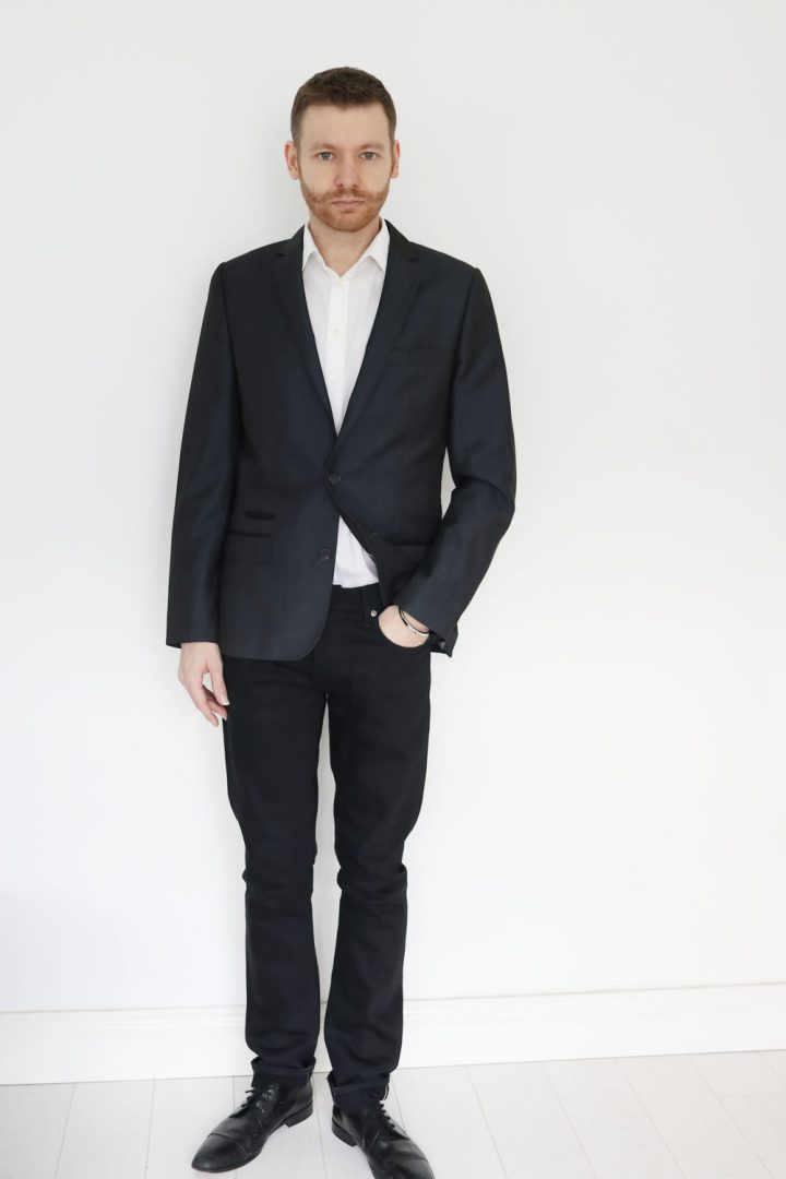 Wearing A Blazer, White Shirt, Smart Jeans And Black Shoes