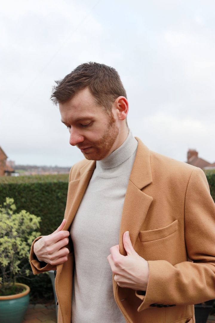 close-up of the roll neck and coat