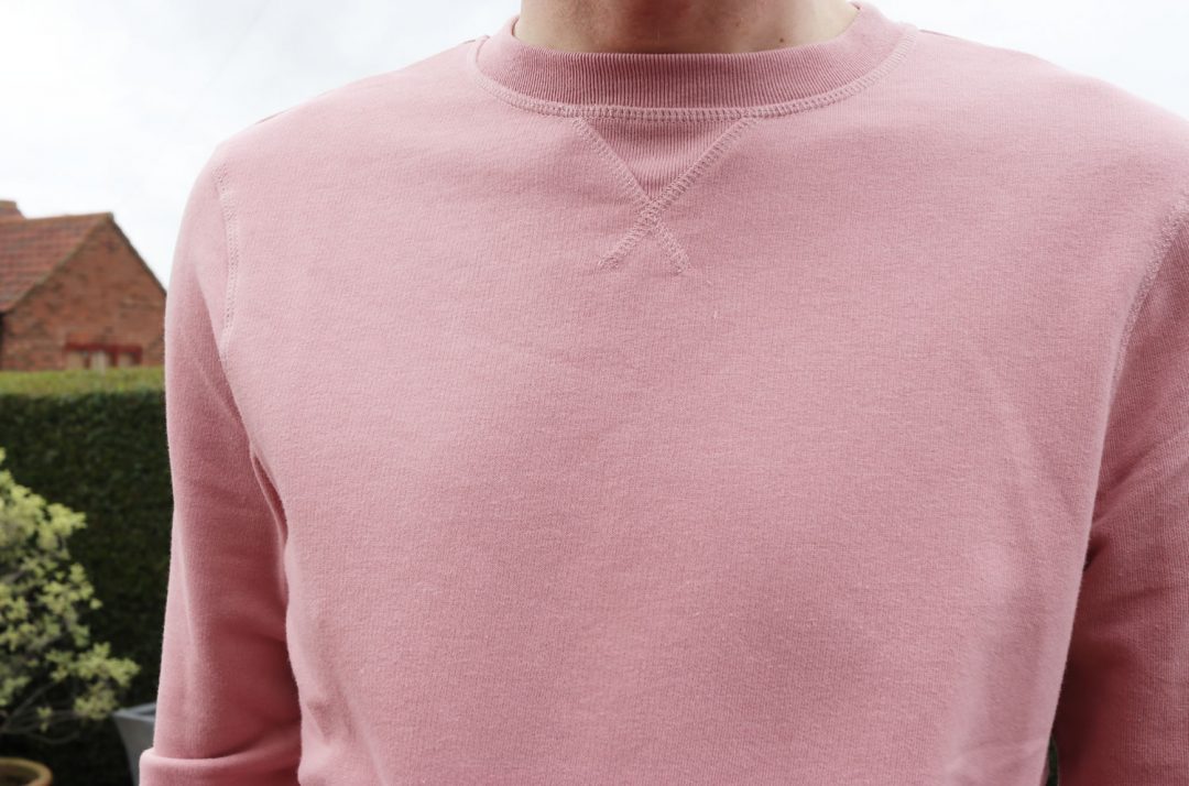 close up of the pink sweatshirt from H&M