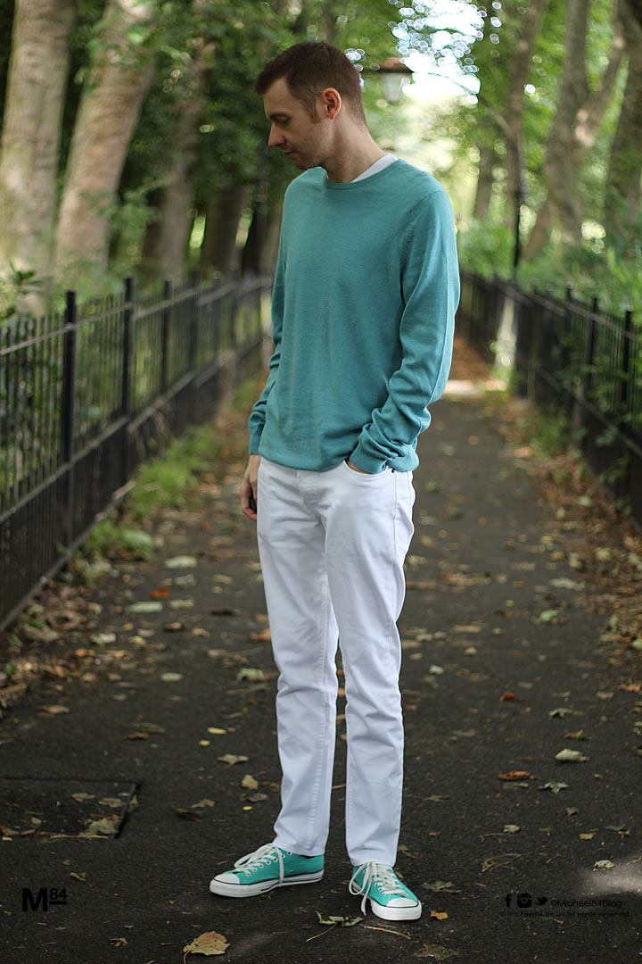 Wearing White Jeans with a green jumper and Converse trainers