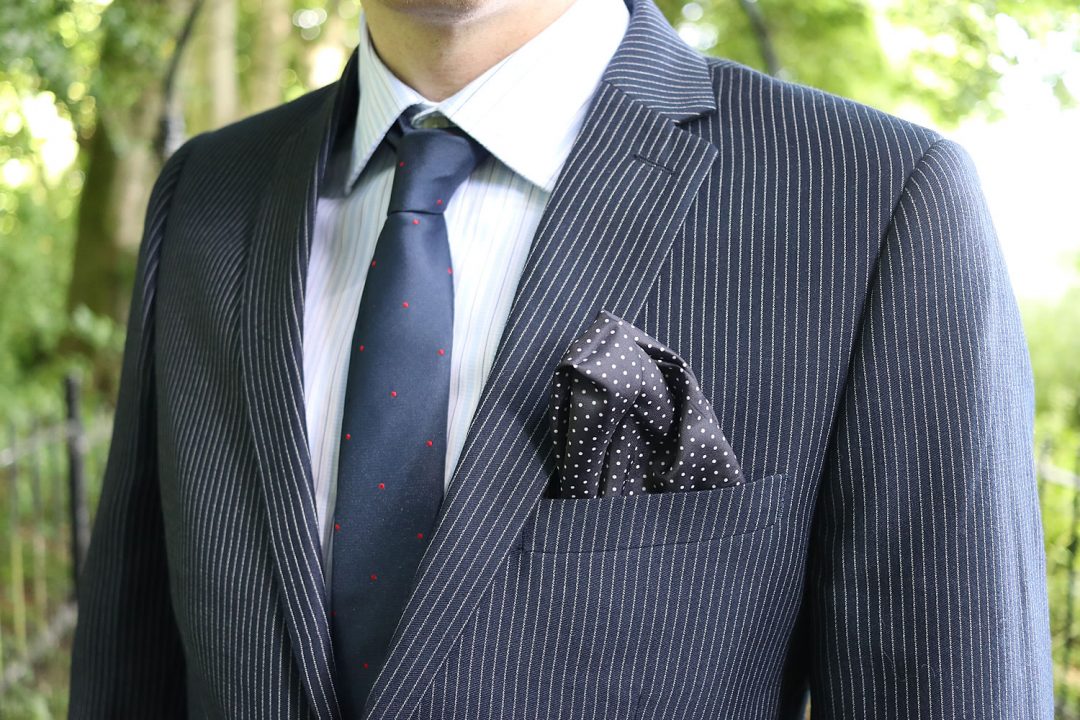 Blue shirt with a blue striped jacket, tie and pocket square