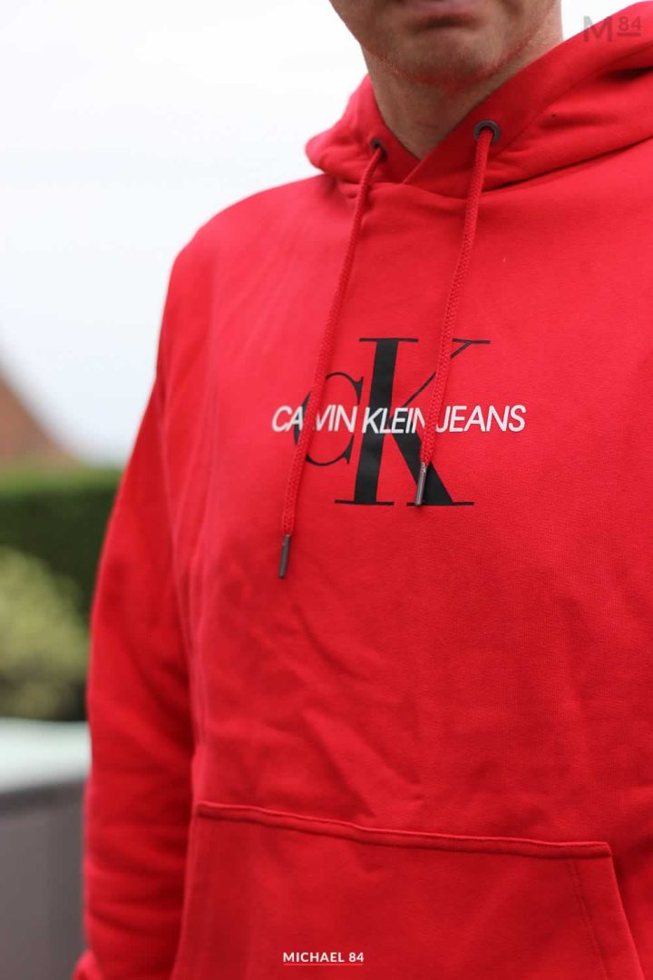 Close up of the CK Hoodie in red